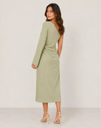 Back view of the sage green one-shoulder dress showing the smooth draped back and column silhouette