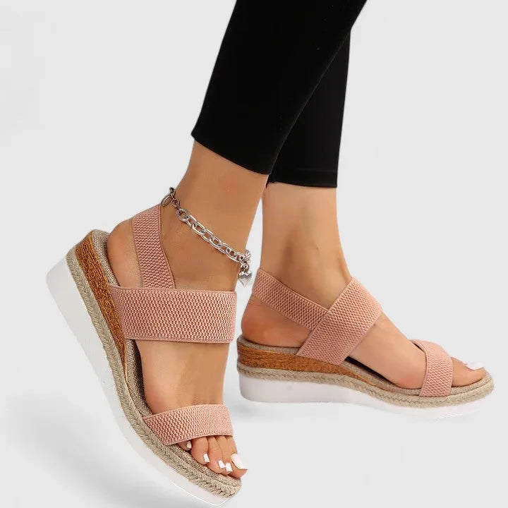 Light grey wedge sandals with soft elastic straps, jute wedge platform and pearl anklet detail