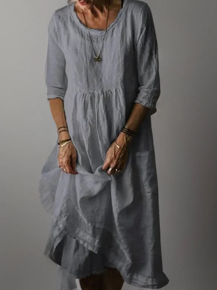 Pale grey linen midi dress with pleated bodice and tiered ruffled hemline