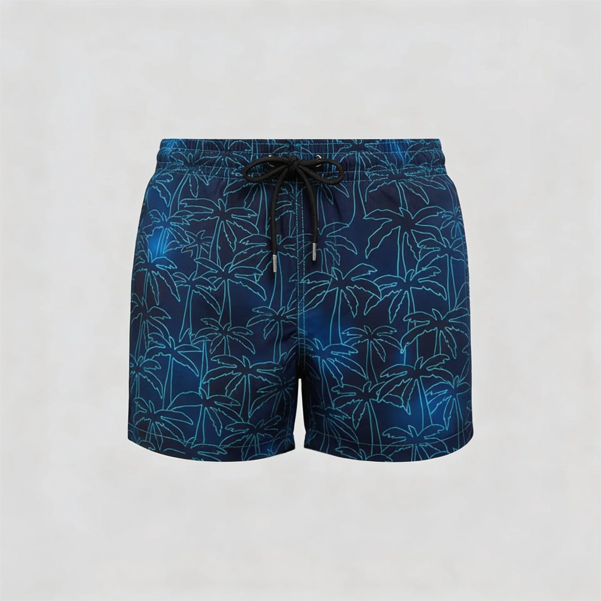 Flat lay front shot of navy swim shorts with all-over teal palm leaf outline print and black drawstring