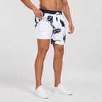 Side view showing the layered construction of swim shorts with compression liner extending below the outer layer