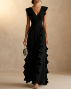 Black V-neck ruffle maxi dress with flutter sleeves, pleated waistband and ankle-skimming hem