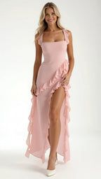 Side view of dark brown ruffled maxi dress showing the asymmetric ruffle overlay and leg slit