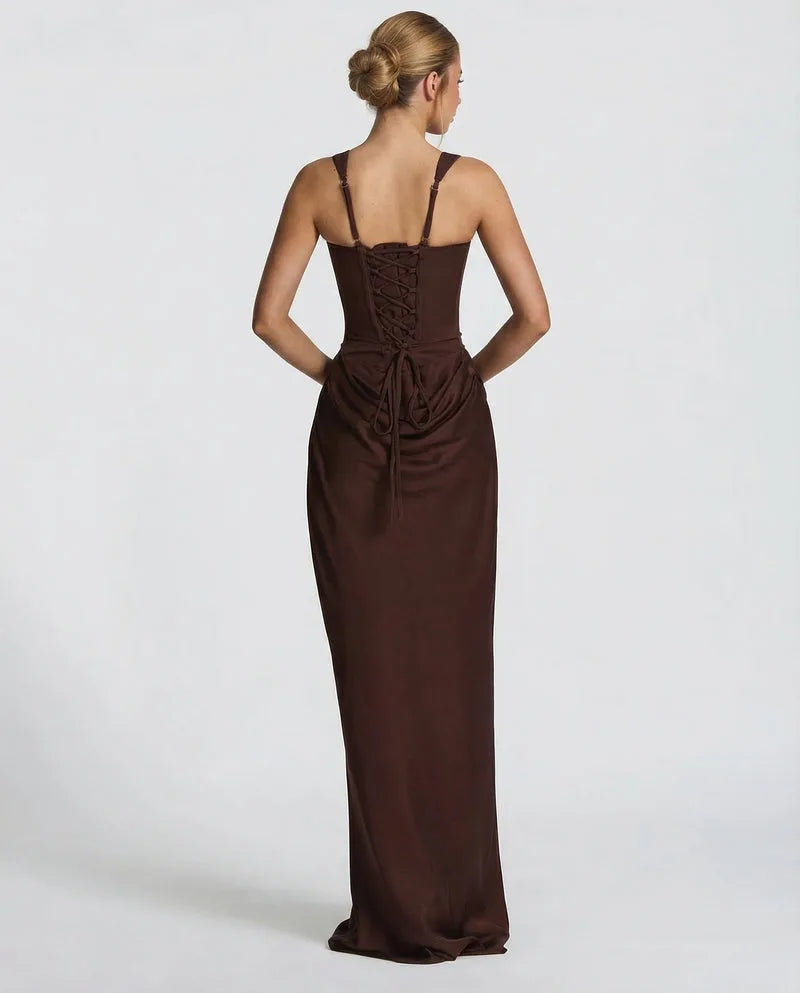 Back view of the brown satin dress showing the lace-up corset back and adjustable shoulder straps