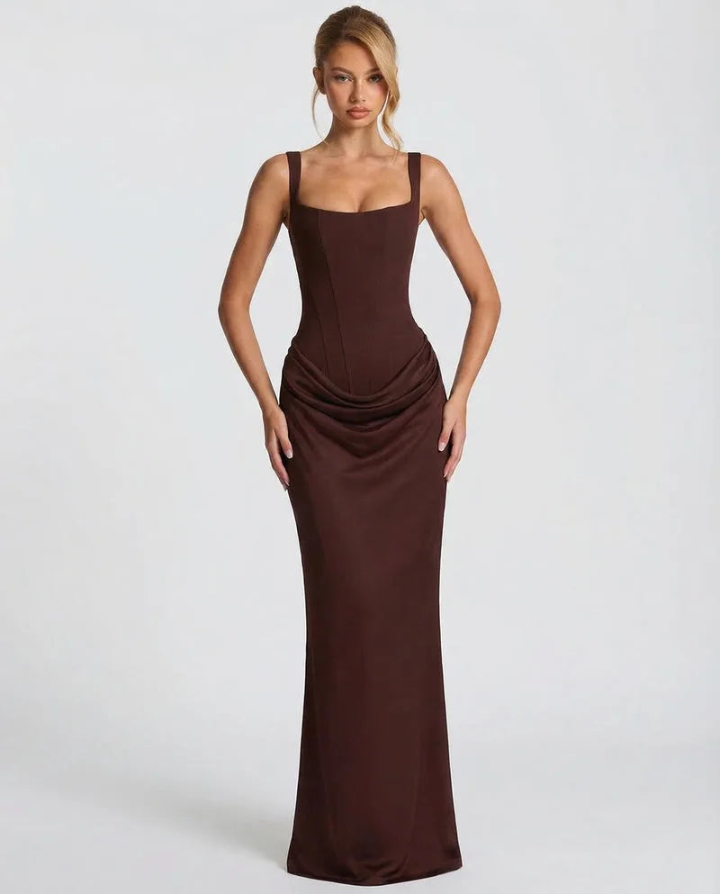 Three-quarter front view of the brown corset dress showing the smooth satin finish and column skirt