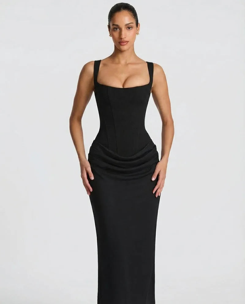 Back view of the black satin dress showing the lace-up corset detailing and thin adjustable straps