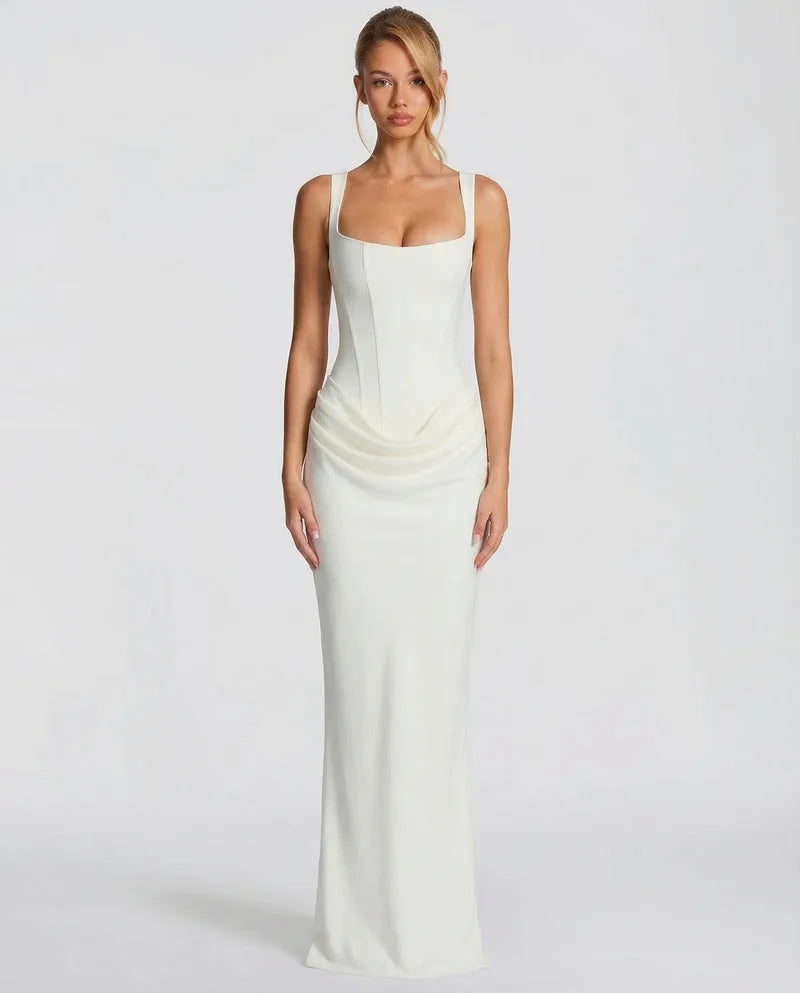 Side view of the black satin dress highlighting the structured boned bodice and fluid skirt drape