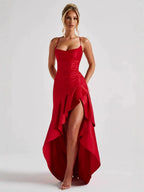 Close front shot outdoors showing the satin sheen of the bodice and the fitted ruched silhouette