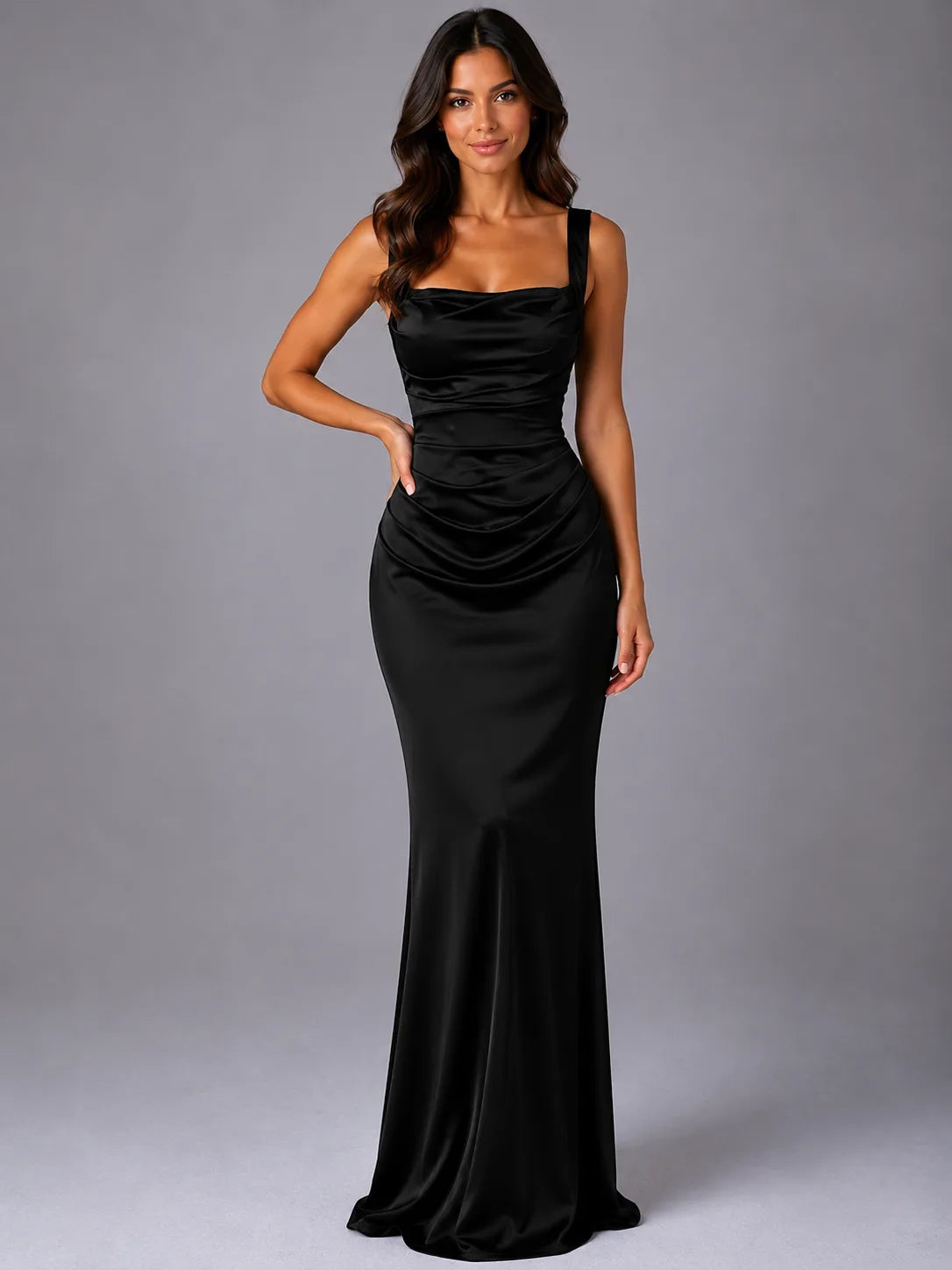 Front view of model wearing the same satin maxi dress in a classic black colourway