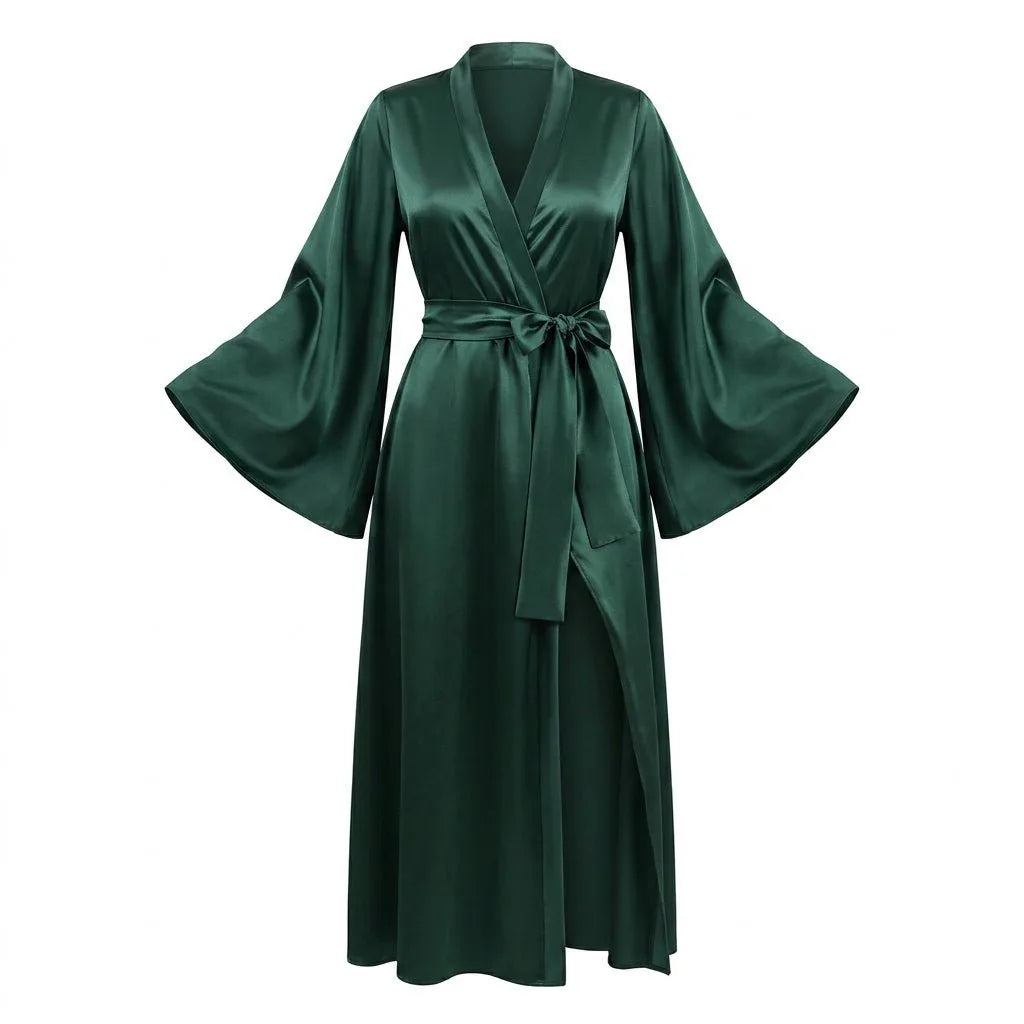 Forest green satin robe laid flat, showing the wrap front, sash belt and bell sleeves