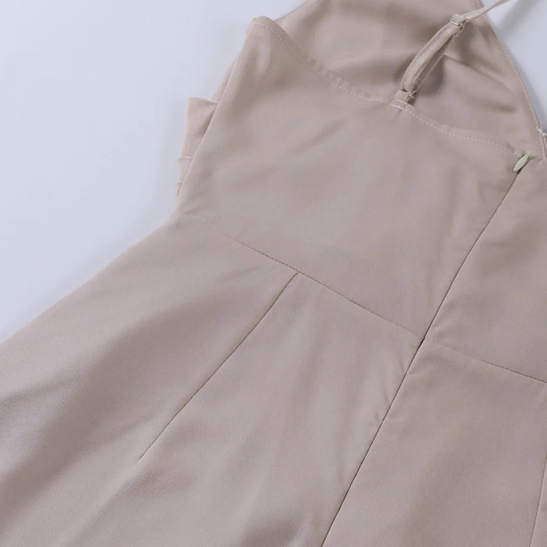Full length view of the satin maxi dress showing the wrap bodice, fitted waist and ankle-length hem