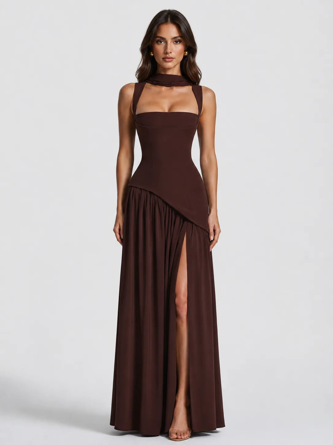Front view of a sculpted brown maxi dress with scarf-tie neckline, cut-out straps and a high side slit