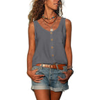 Front view of a grey sleeveless button-up top with a scoop neck and chest pocket, worn with denim shorts