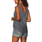 Back view of the grey singlet top showing the scoop back and relaxed drape over denim shorts