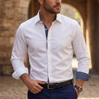Close-up of a white slim-fit dress shirt with navy polka-dot collar trim and visible button placket detail