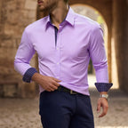 Model adjusting the hem of a lilac purple slim-fit shirt with navy patterned collar and cuff trim