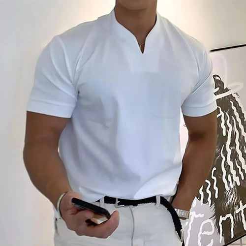 Front view of a white split-neck polo tee with short sleeves and a chest pocket, worn untucked over white pants