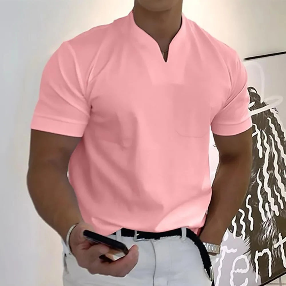 Pink split-neck polo tee with ribbed short sleeves and a single chest pocket, close front view
