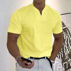 Yellow split-neck polo tee with a relaxed fit, chest pocket and ribbed sleeve cuffs