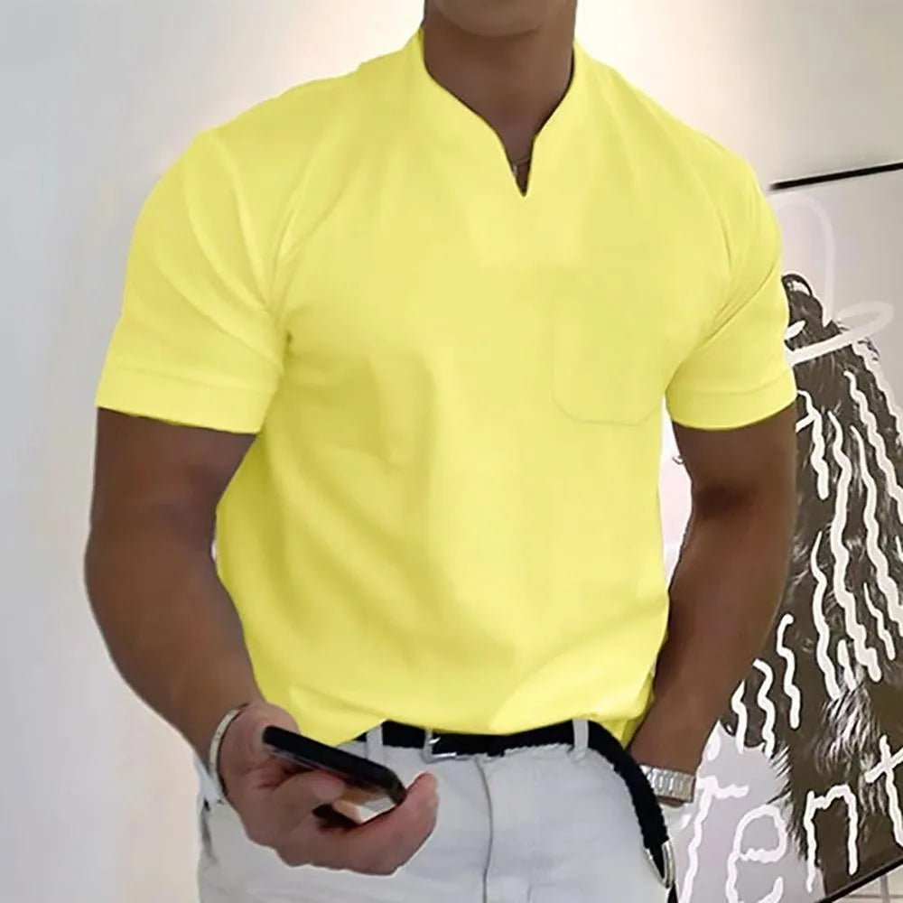Yellow split-neck polo tee with a relaxed fit, chest pocket and ribbed sleeve cuffs