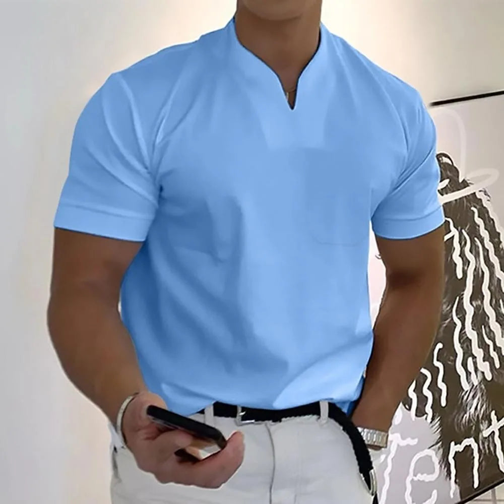 Light blue split-neck short sleeve polo shirt with ribbed cuffs and a chest pocket