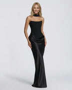 Full-length front view of the black corset gown highlighting the draped satin skirt and fitted bodice