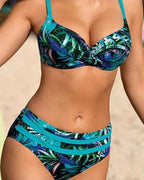 Tropical leaf print underwire bikini top in teal, green and navy with matching strappy high-waisted bottoms, front view