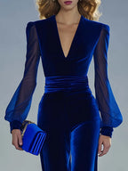 Close-up of the royal blue velvet bodice showing the ruched waist and sheer mesh sleeve texture