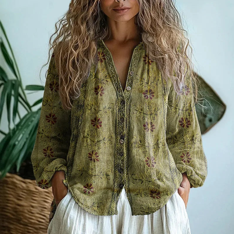 Olive green vintage floral print shirt with embroidered trim detail along the button-down front