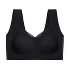 Flat front view of the black version showing smooth moulded cups and sheer mesh V-panel